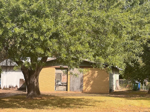 view of home's exterior featuring a yard