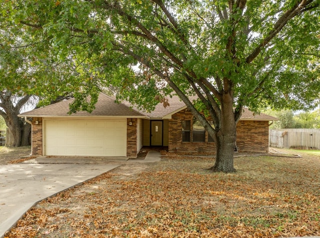 ranch-style home with a garage