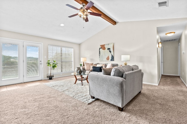 carpeted living room featuring vaulted ceiling with beams and ceiling fan