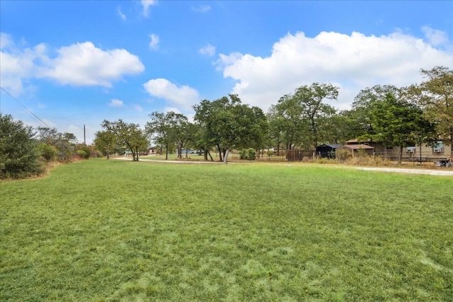 537 Leisure Ln, Cedar Creek, TX 78612 - view of home's community with a yard