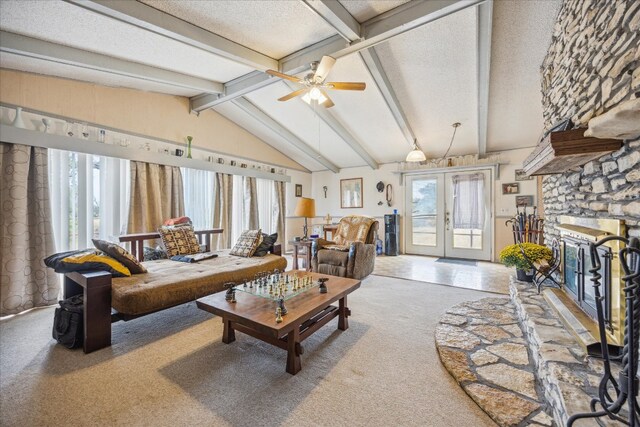 living room with french doors, a textured ceiling, carpet, ceiling fan, and lofted ceiling with beams