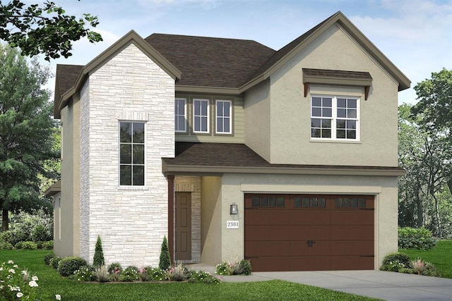 view of front facade with a garage and a front lawn