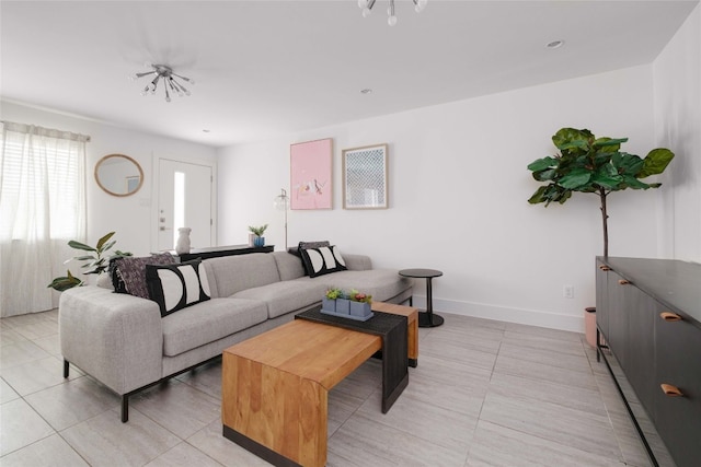 living room with light tile patterned floors