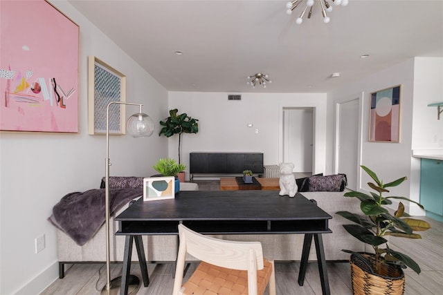 dining space featuring light hardwood / wood-style floors