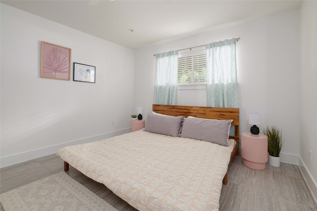 bedroom featuring light wood-type flooring