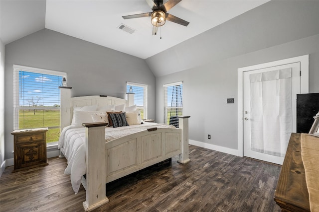 bedroom featuring ceiling fan, dark hardwood / wood-style flooring, and lofted ceiling