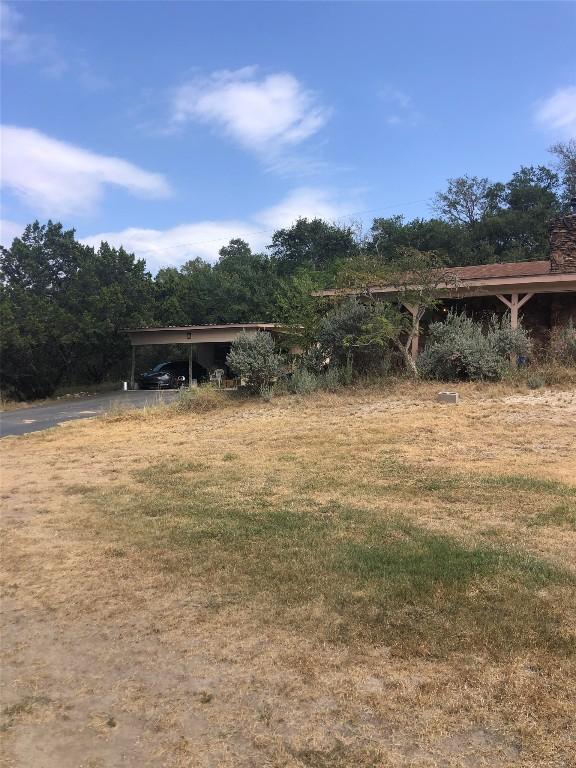 view of yard featuring a carport