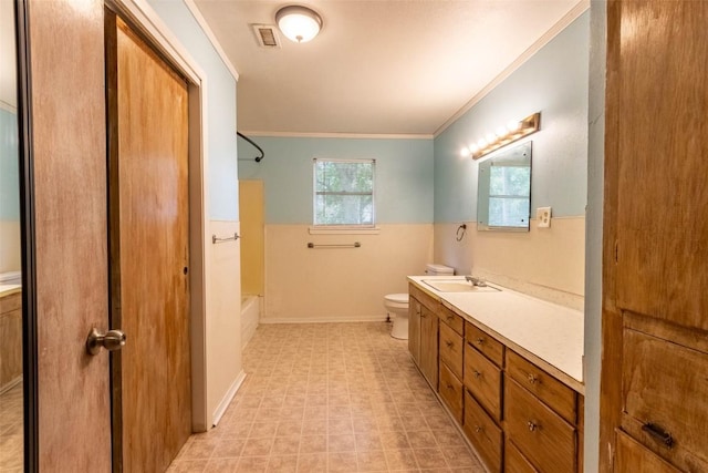 full bathroom with vanity, separate shower and tub, toilet, and crown molding