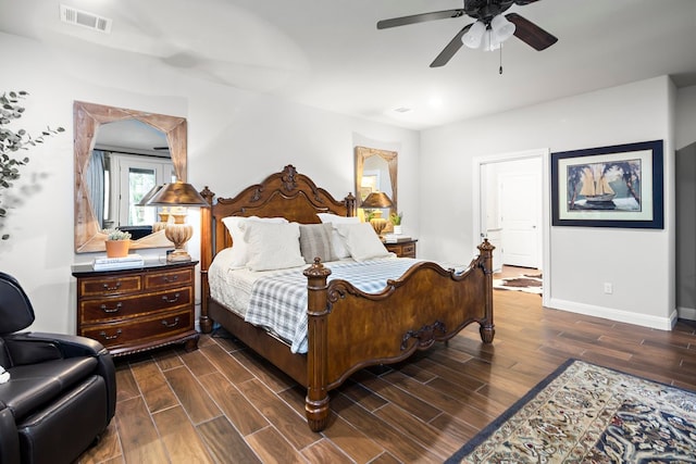 bedroom featuring ceiling fan and dark hardwood / wood-style flooring