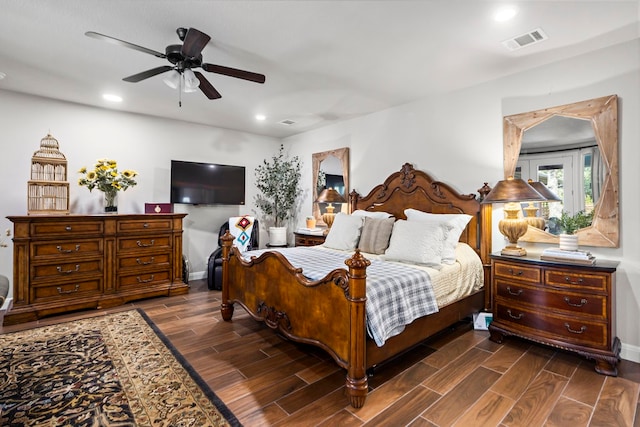 bedroom featuring dark hardwood / wood-style floors and ceiling fan