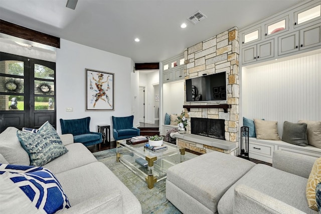 living room featuring a fireplace