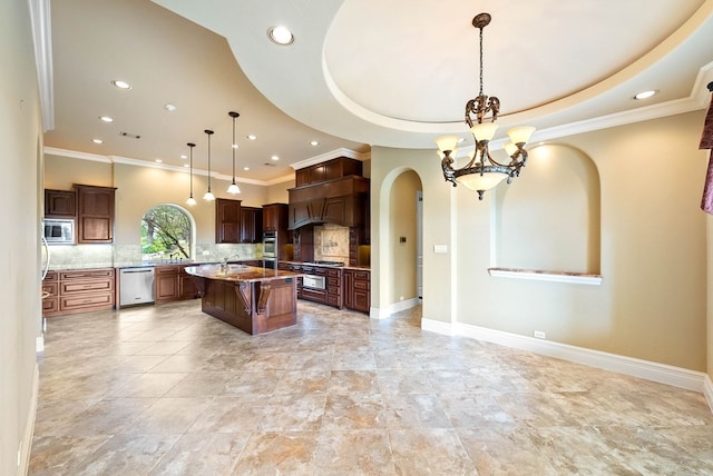 kitchen with stainless steel appliances, a kitchen island, backsplash, hanging light fixtures, and a chandelier