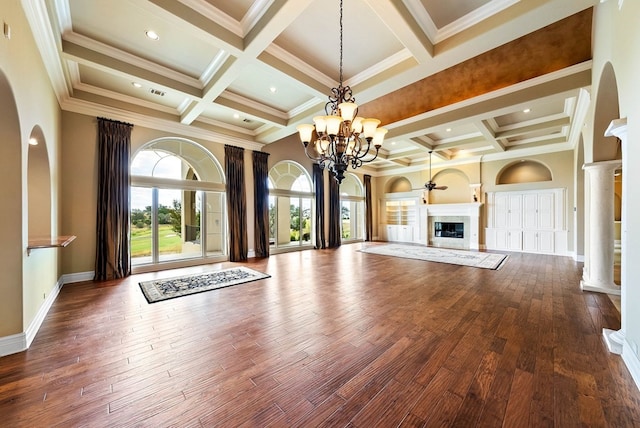 unfurnished living room featuring ornamental molding, hardwood / wood-style flooring, and coffered ceiling