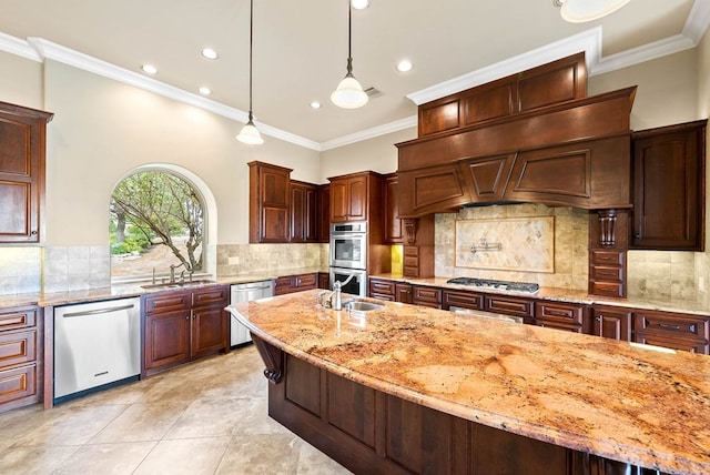 kitchen featuring light stone countertops, appliances with stainless steel finishes, ornamental molding, and hanging light fixtures