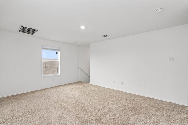 unfurnished room with carpet floors