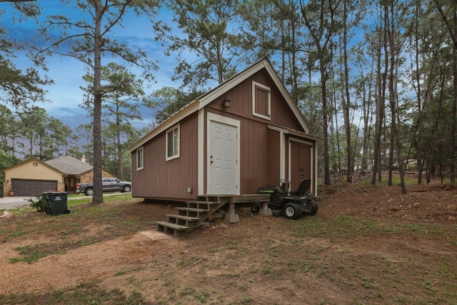 view of outbuilding featuring a garage