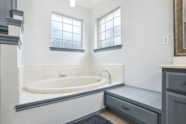 bathroom featuring a bathing tub and vanity