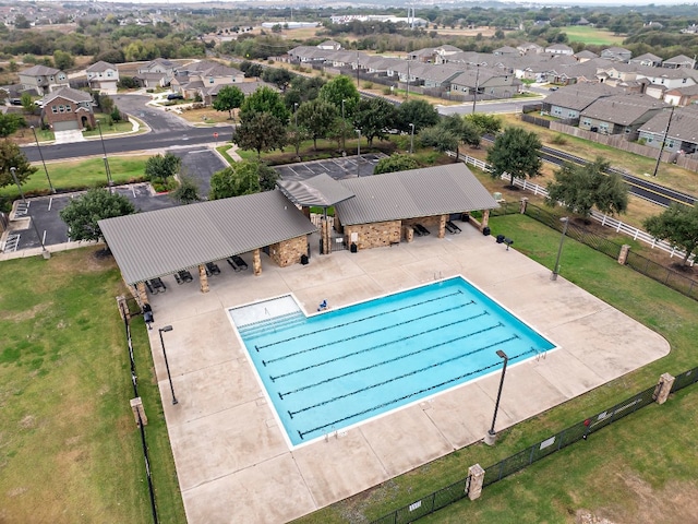 view of pool featuring a yard and a patio area