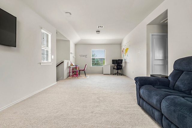 sitting room with carpet floors