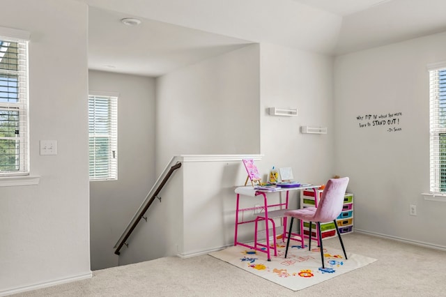 recreation room featuring carpet and plenty of natural light