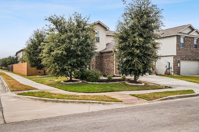 obstructed view of property featuring a garage