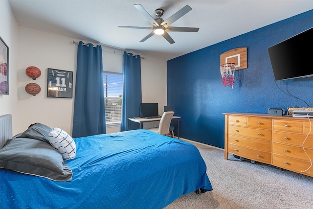 bedroom with ceiling fan and carpet