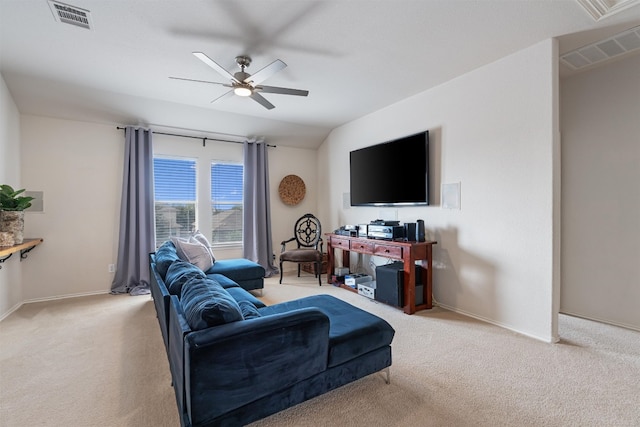 living room with light colored carpet and ceiling fan