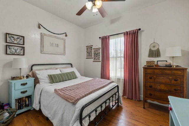 bedroom featuring ceiling fan and wood-type flooring