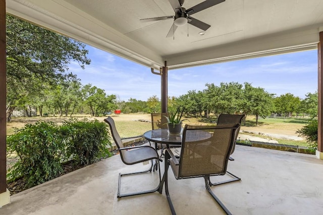 view of patio with ceiling fan