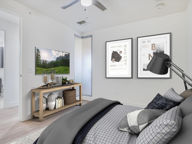 bedroom featuring ceiling fan and light hardwood / wood-style flooring