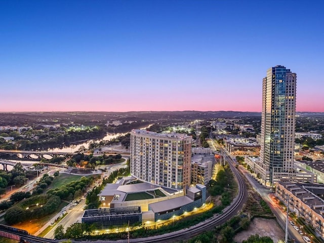 aerial view at dusk with a city view