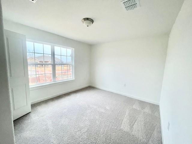 empty room featuring carpet