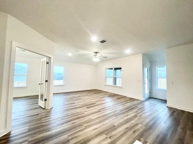 empty room with wood-type flooring and ceiling fan