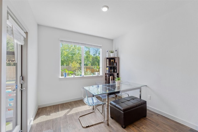 dining area with hardwood / wood-style flooring