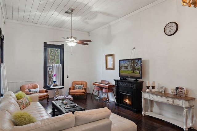 living room with dark hardwood / wood-style flooring, wood ceiling, and ceiling fan