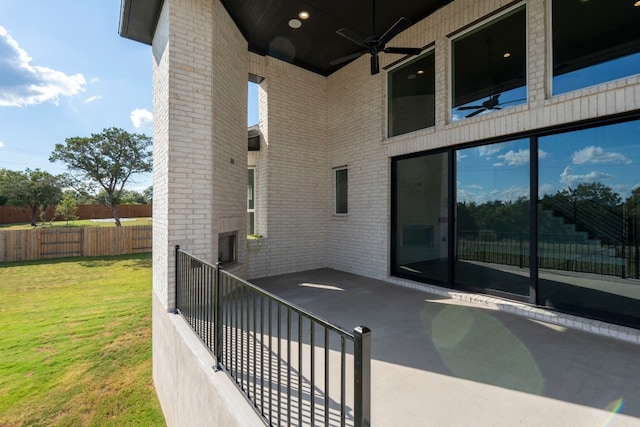 view of patio featuring ceiling fan