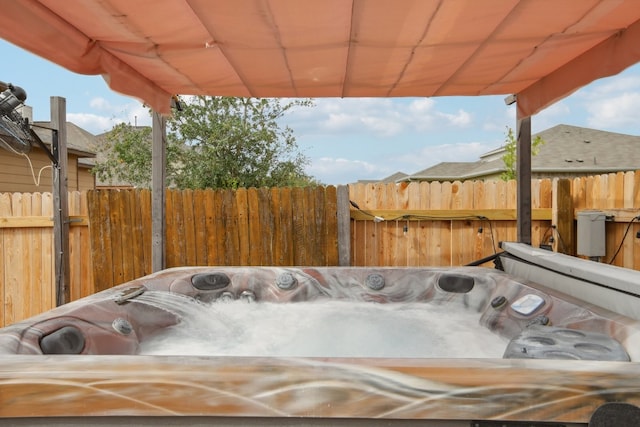 view of patio featuring a hot tub