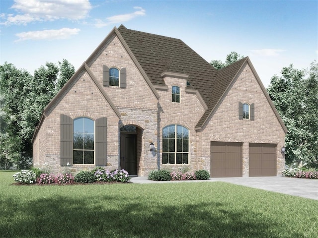 view of front of house with a garage and a front yard