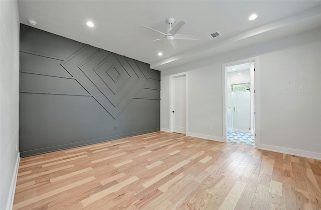 unfurnished room with light hardwood / wood-style floors and ceiling fan