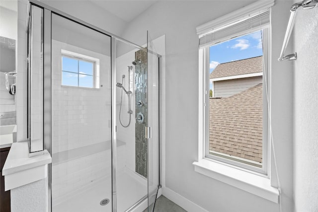 bathroom featuring an enclosed shower