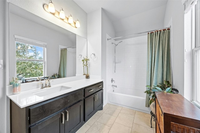 bathroom featuring vanity, shower / bath combination with curtain, and tile patterned floors