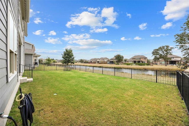 view of yard featuring a water view