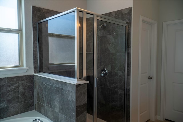 bathroom featuring walk in shower