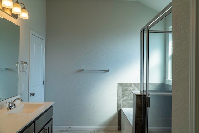 bathroom with independent shower and bath and vanity