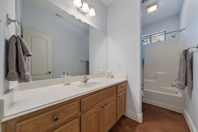 bathroom with washtub / shower combination, vanity, and tile patterned flooring