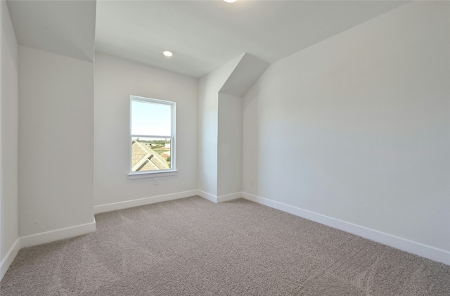 7701 Becasseau Dr, Austin, TX 78738 - bonus room featuring baseboards and light carpet