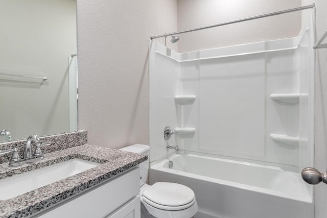 full bathroom featuring toilet, vanity, and shower / bathtub combination