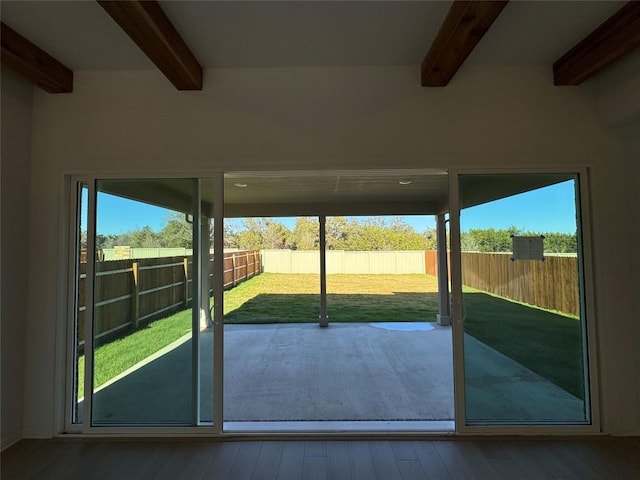 entryway with beam ceiling