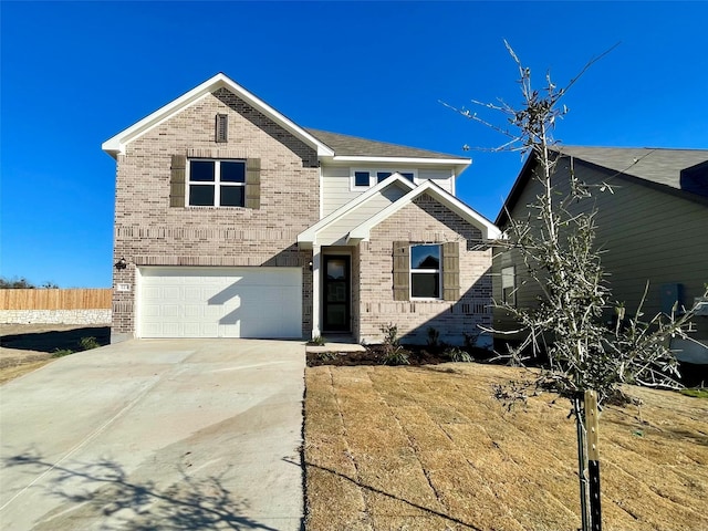 view of front of property with a garage