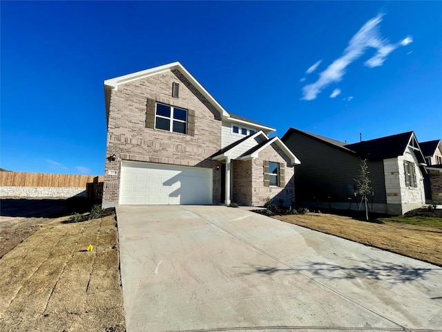 view of front of property with a garage